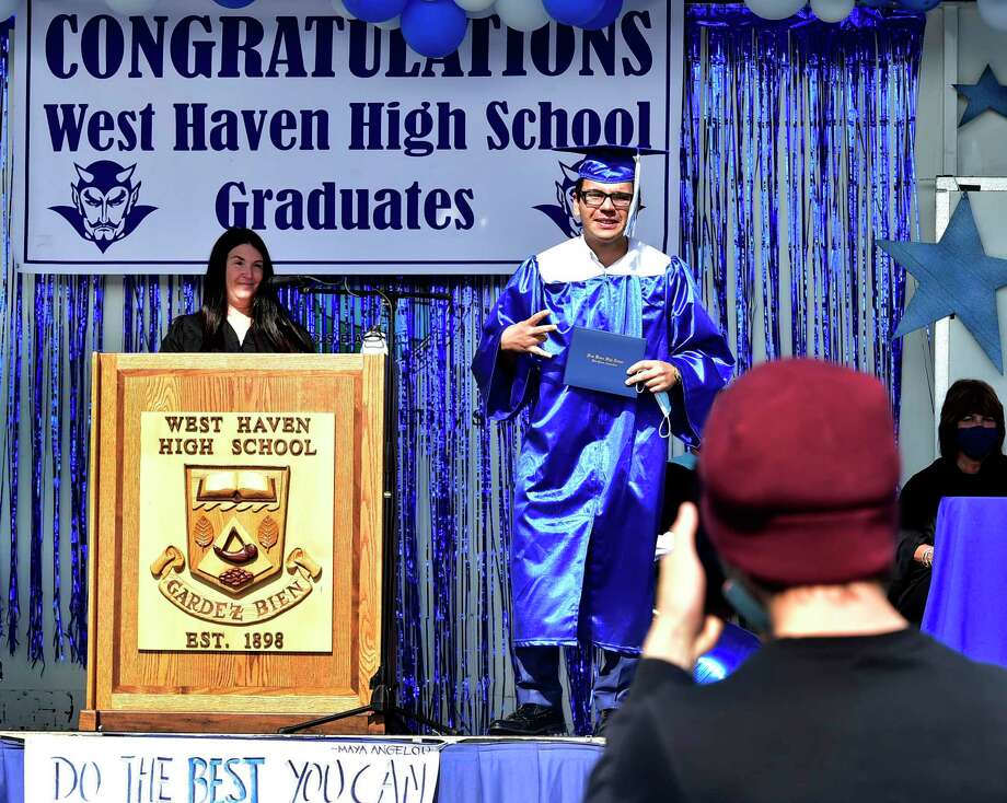 graduation ceremony tuesday, with seniors arrivingin waves of 35