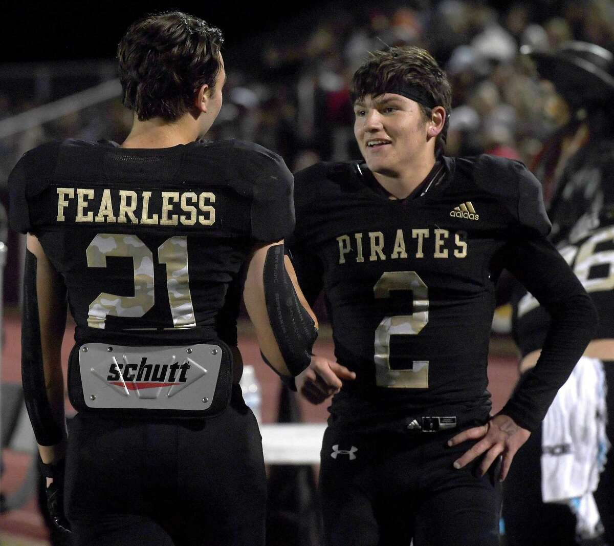 Vidor's Eli Simmons talks with #21 after bringing in a score against Lumberton during Friday's match-up in Vidor. Photo made Friday, November 5, 2021 Kim Brent/The Enterprise