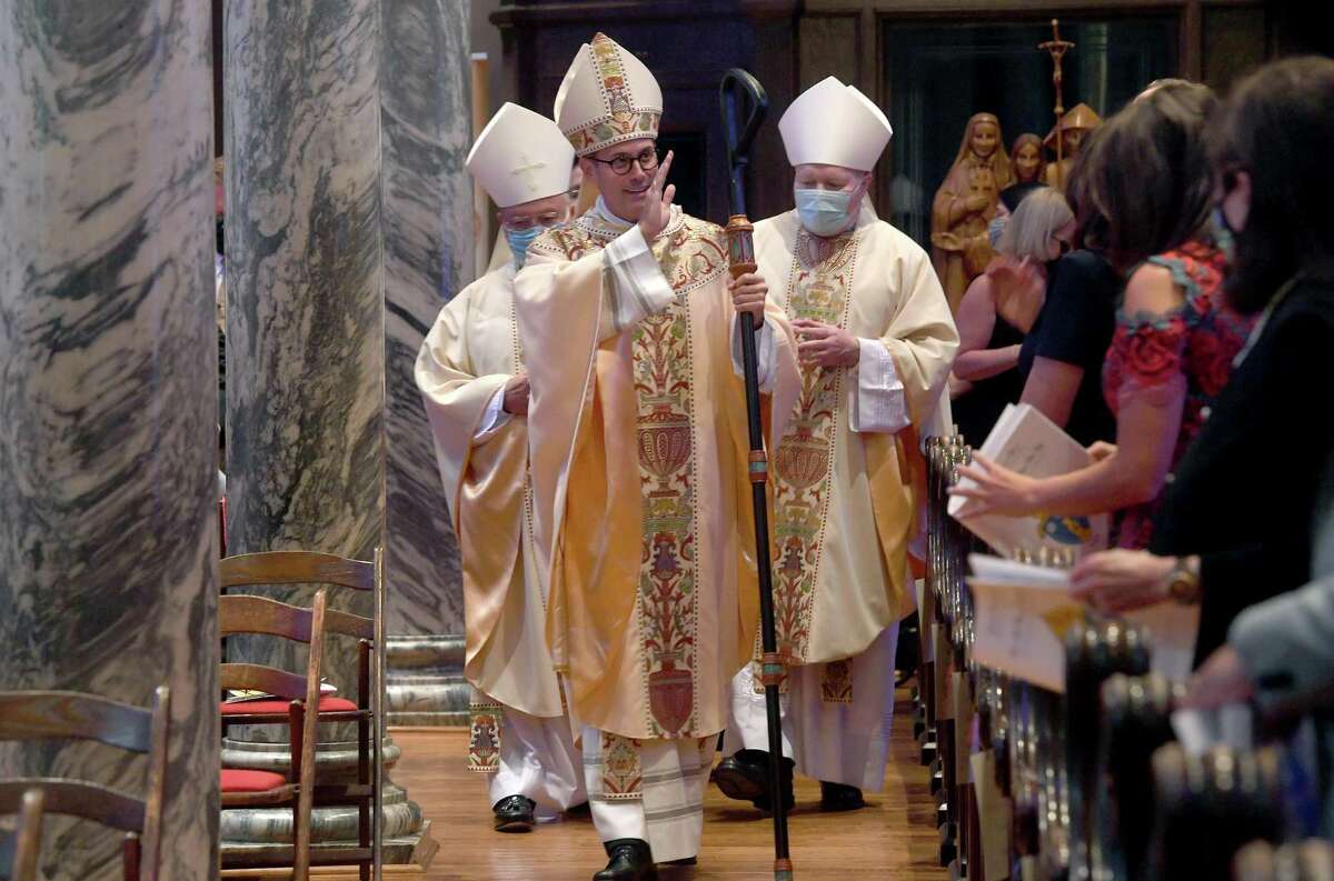 Bishop David Toups blesses the gathering after he is ordained as the 6th Bishop of the Diocese of Beaumont at St. Anthony Cathedral Basilica. It is the first ordination ceremony to be held at the basilica. Photo taken Friday, August 21, 2020 Kim Brent/The Enterprise