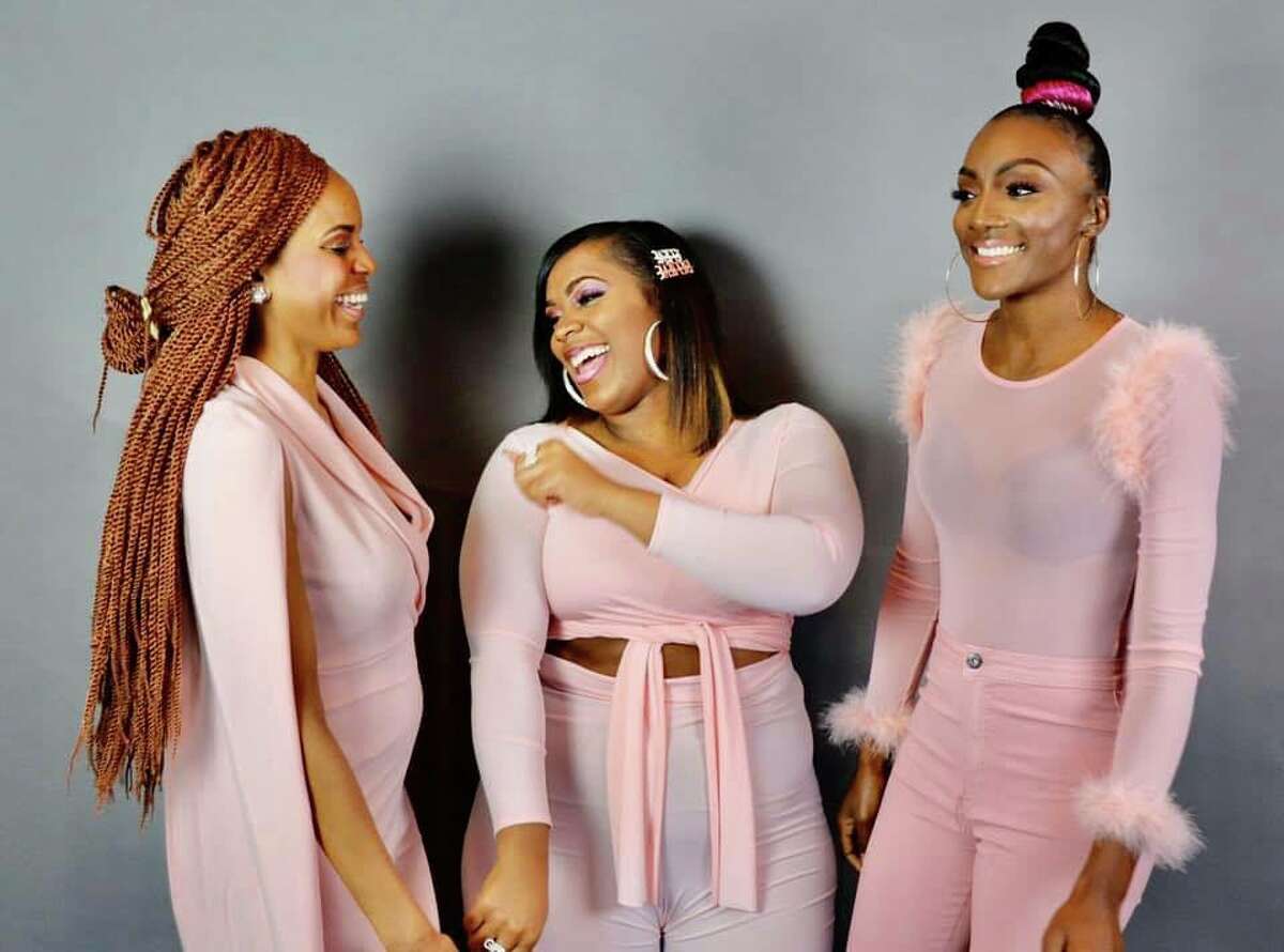 Staci Childs with GirlTalk U participants Jamila and Ashley at the nonprofit's annual Christmas photoshoot.