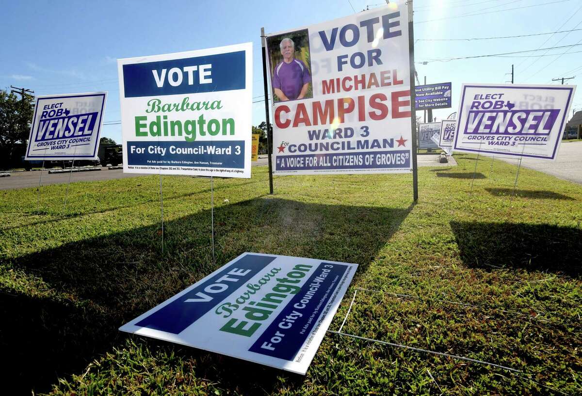 Election signs fill the walk outside Groves City Hall before Tuesday's election. Groves and Bevil Oaks voters will both head to the polls for elected positions and propositions. Photo made Monday, November 1, 2021 Kim Brent/The Enterprise