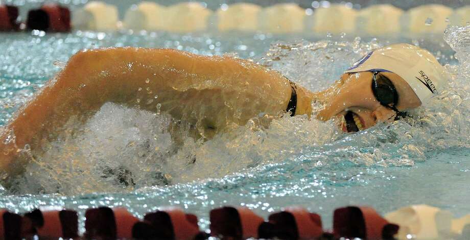 katie ledecky swims in the 800-meter freestyle event during the