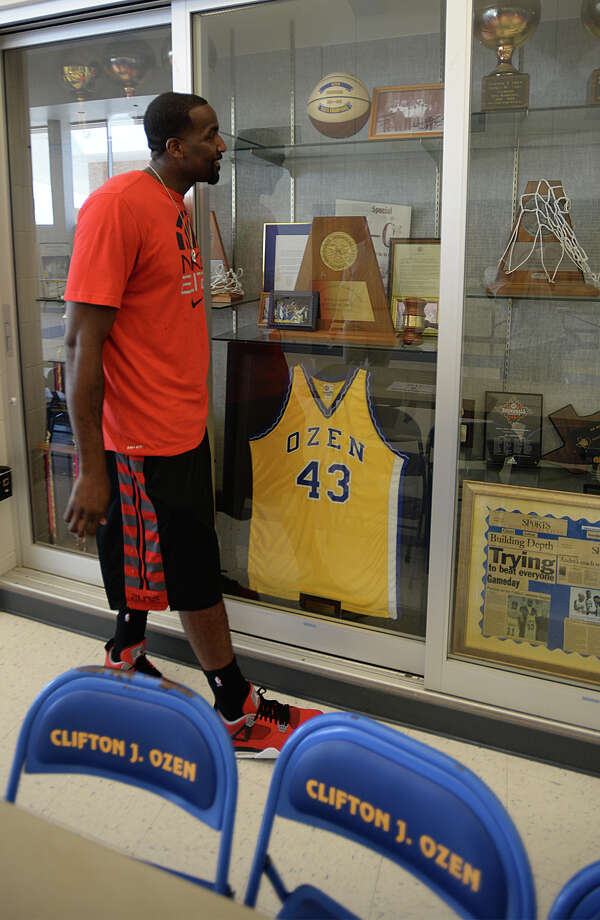kendrick perkins,kendricknunn basketball star kendrick perkins walks past the trophy cases at