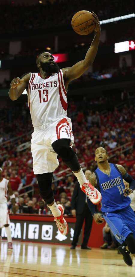 houston rockets guard james harden (13) goes up for a basket