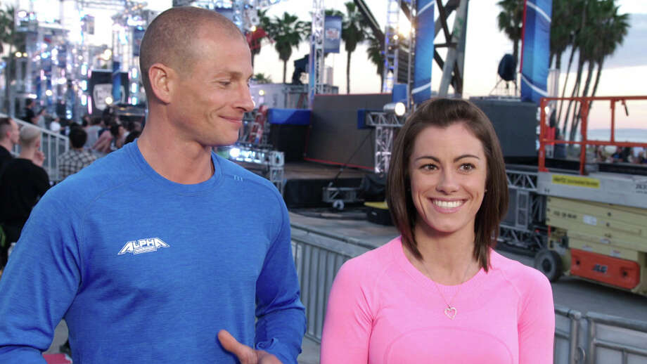 kacy catanzaro poses with fellow "ninja star" and boyfriend