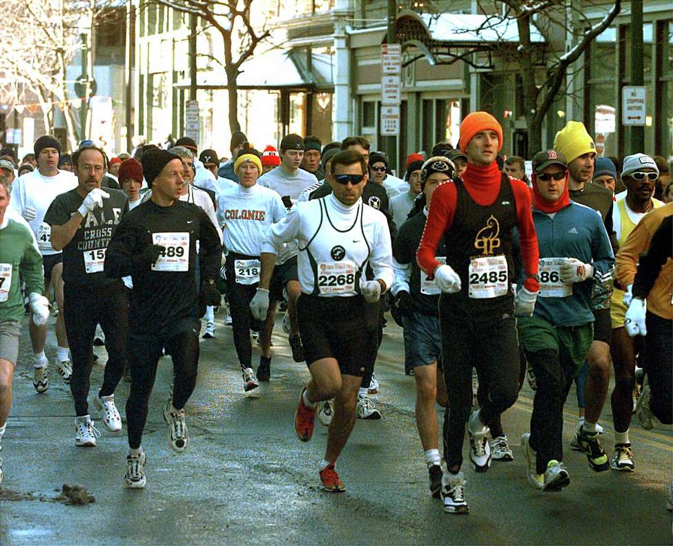 runners participate in the annual turkey trot running race on