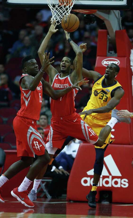 houston rockets forward trevor ariza (1) and center clint capela