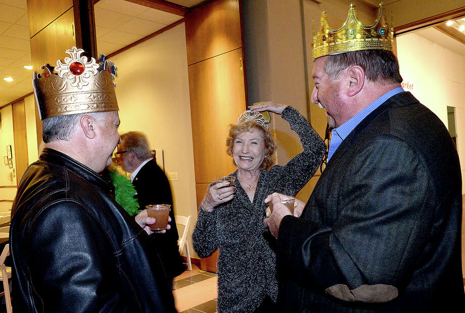 lynda jones shows her tiara as she socializes with husband pat