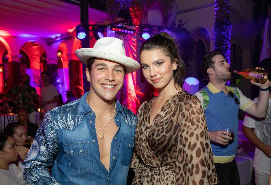 singer austin mahone poses with maya henry at san antonio