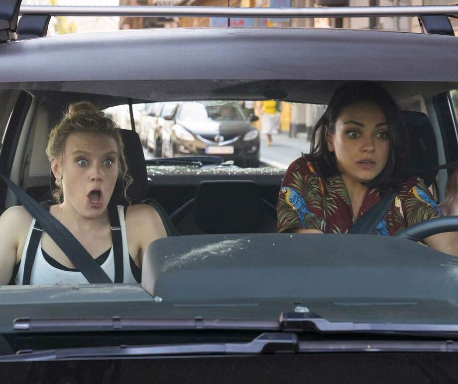 kate mckinnon and mila kunis are unlikely spies in "spy who