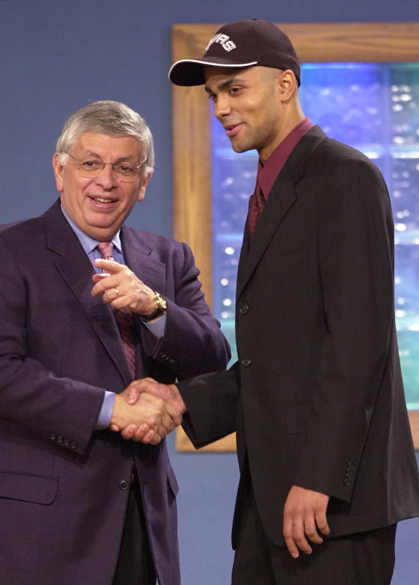 Tony Parker shaking NBA commissioner David Stern's hand during NBA draft night in 2001.