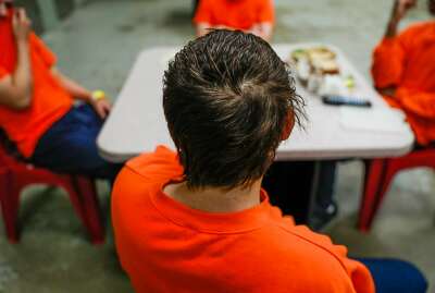 Incarcerated youths eat lunch at the Fresno County juvenile hall in Fresno.