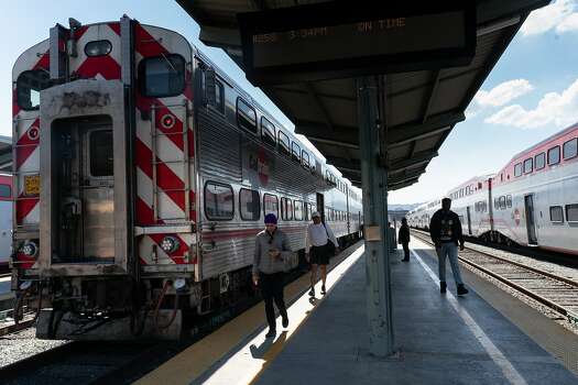A Caltrain deboards three passengers on March 19, 2020 in San Francisco, California.