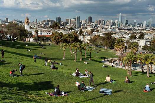A few people in Mission Dolores Park on March 19, 2020 in San Francisco, California.