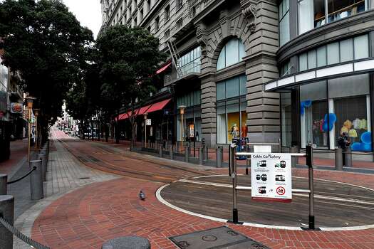 The Powell St. cable car turnaround is empty on Thursday, March 19, 2020, in San Francisco, California.