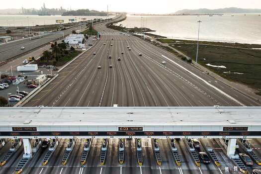 The Bay Bridge Toll Plaza had little traffic on the evening on March 19, 2020 in Oakland, California.