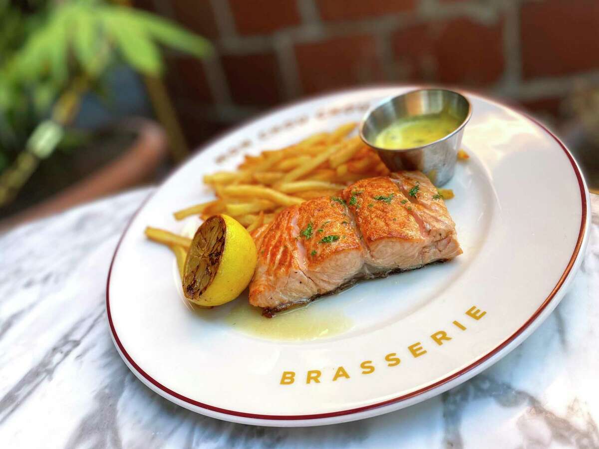 Salmon comes with bearnaise sauce and frites at Brasserie Mon Chou Chou, the new French restaurant at the Pearl.