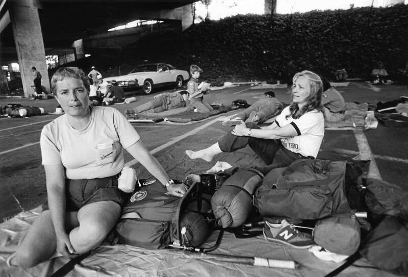 Susan "Butch" Henley (left) and Jeannie Harmon were among the hikers who camped in a parking lot near the Freemont Street Offramp on Hikanation's first night.