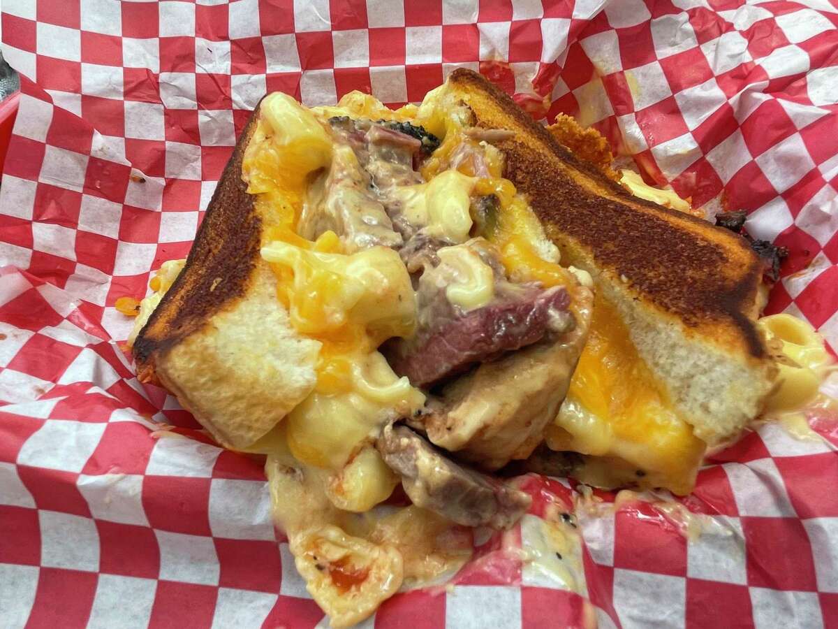 The Mac Daddy is a grilled brisket grilled cheese topped with mac and cheese at B-Daddy's BBQ.