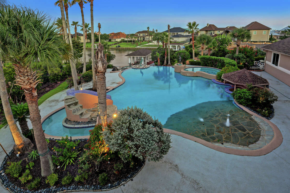 Another view from reverse angle from above of the large backyard swimming pool. 