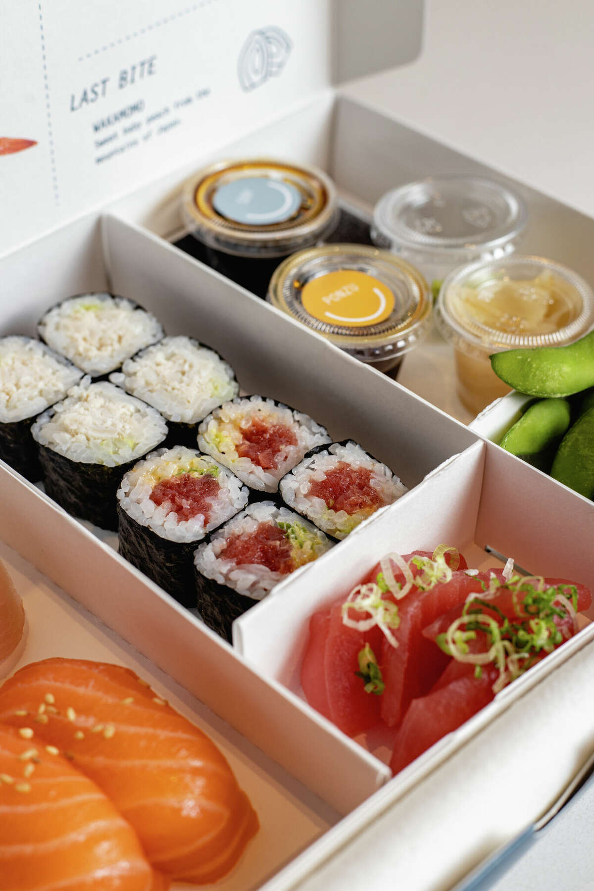 A box containing various kinds of sushi