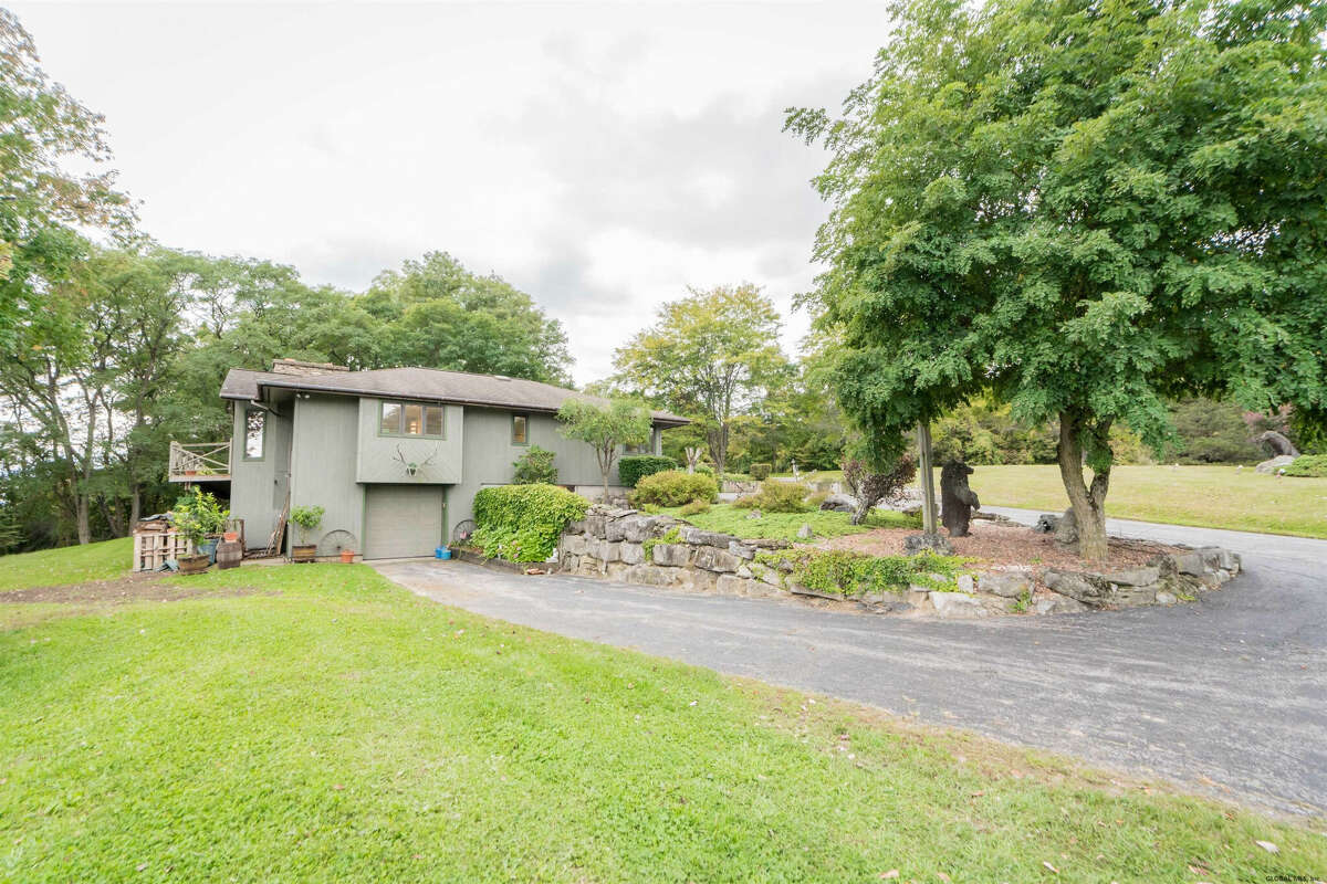 How much does this open concept Milton house cost?