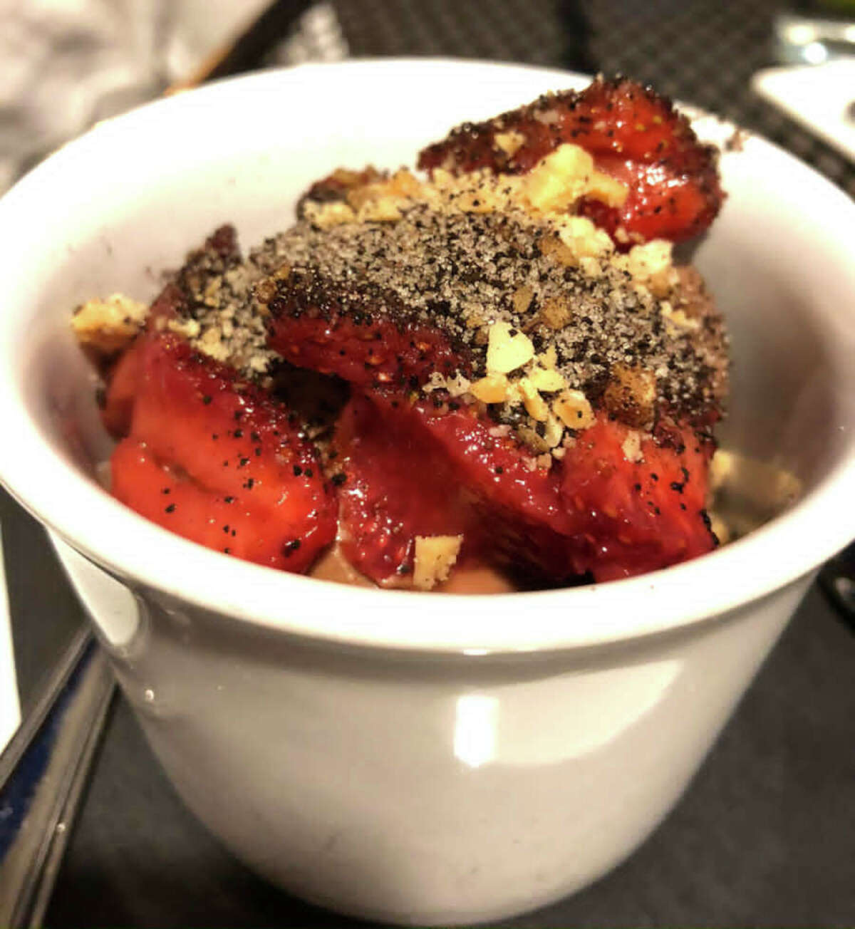 Nutella mousse topped with strawberries and crushed cookies at Radici Kitchen & Bar.