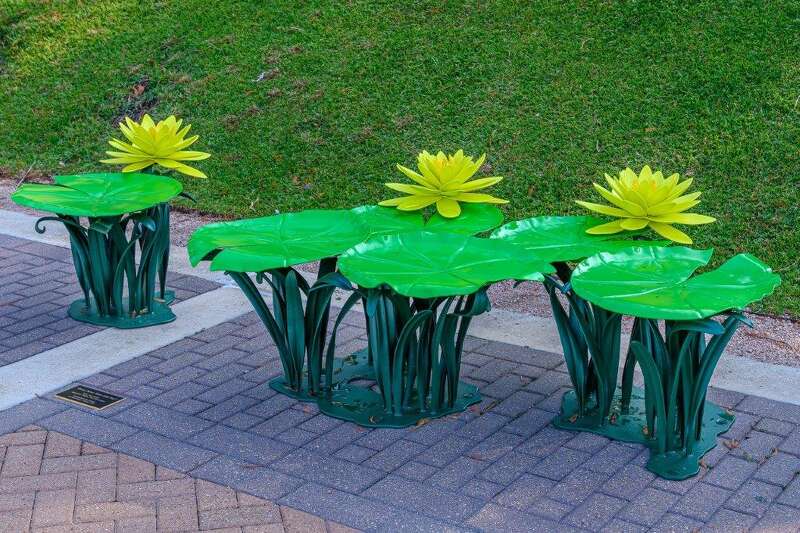 A bench in the shape of lily pads, located in The Woodlands, Texas.