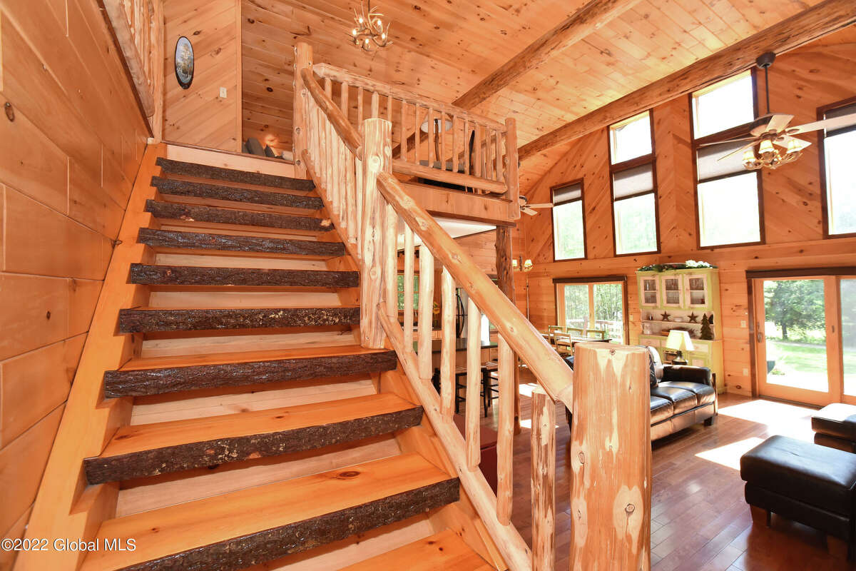 How much does openconcept log cabin on Crystal Lake cost?