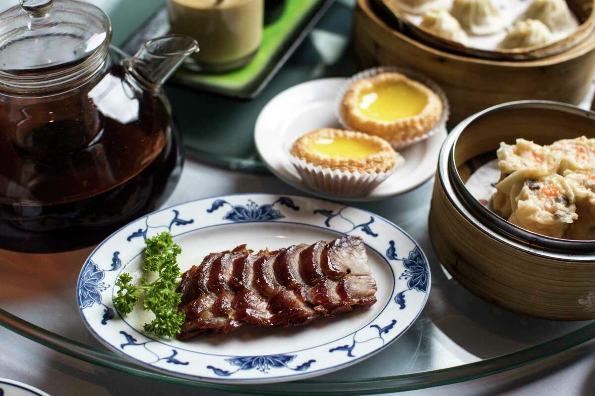 Spread of char siu and assorted dim sum.