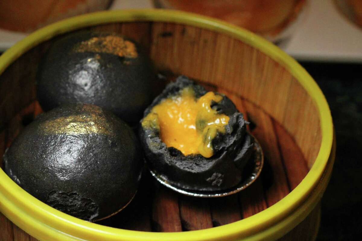 Black baos with salted yolk filling