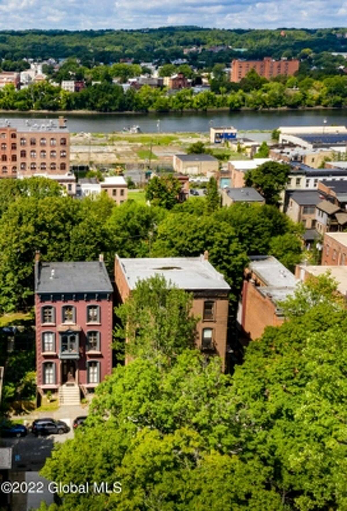 Can you guess the price of this historic brownstone in Troy?