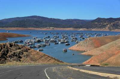 A large number of houseboats is seen on Lake Oroville, where the water level is far below normal.