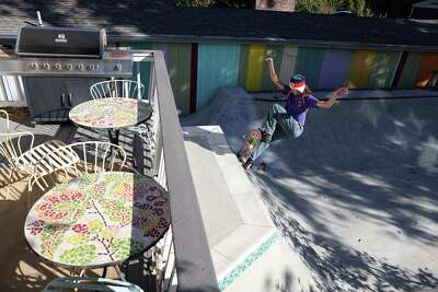 Minna Stess, a 16-year-old Olympic hopeful, practices on the backyard skatepark at her family’s home in Petaluma.