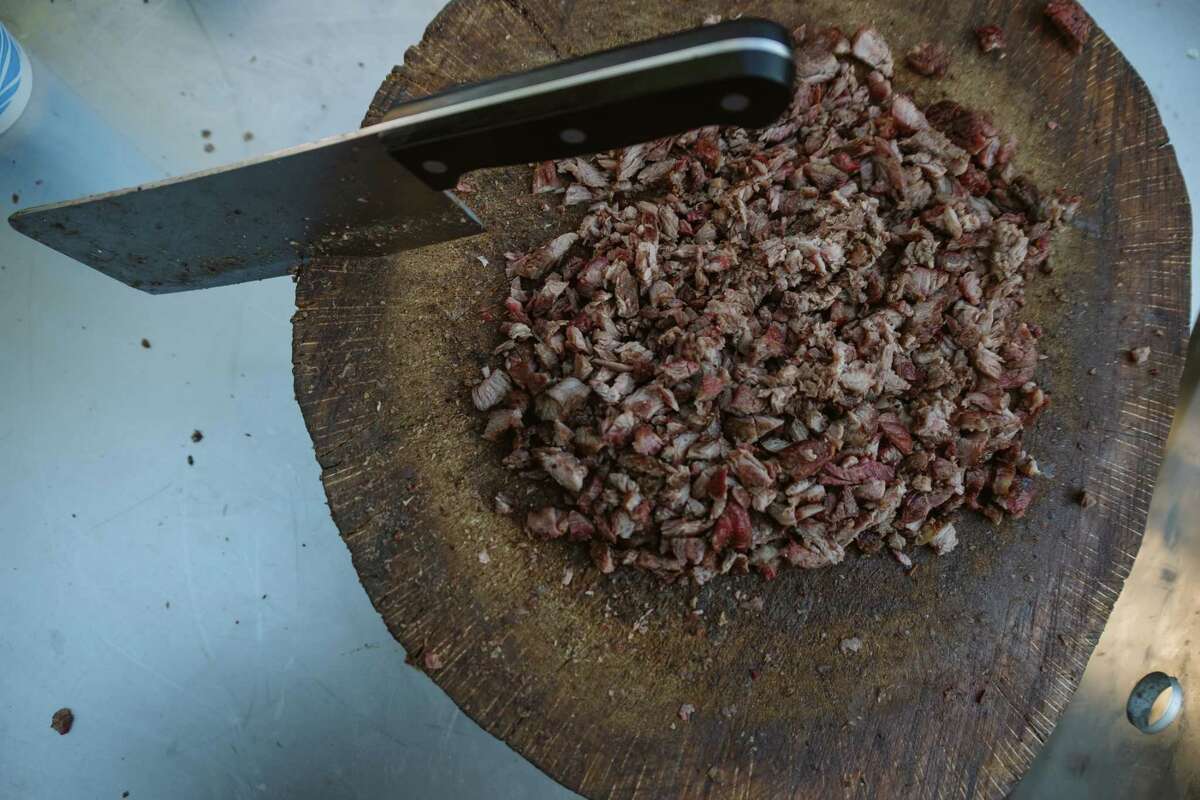 Chopped meat on cutting board