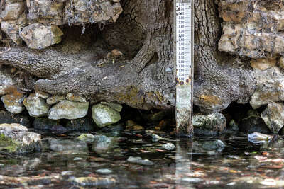 A gauge measuring the outflow of Comal Springs in Landa Park, New Braunfels, after Stage 4 water use restrictions were declared by the Edwards Aquifer Authority