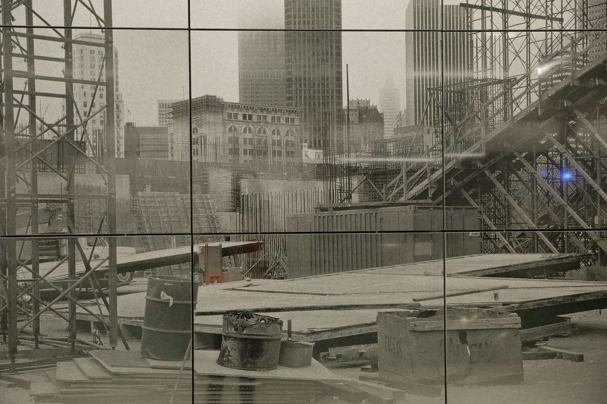 A photograph shows the excavation and building process of Moscone Center