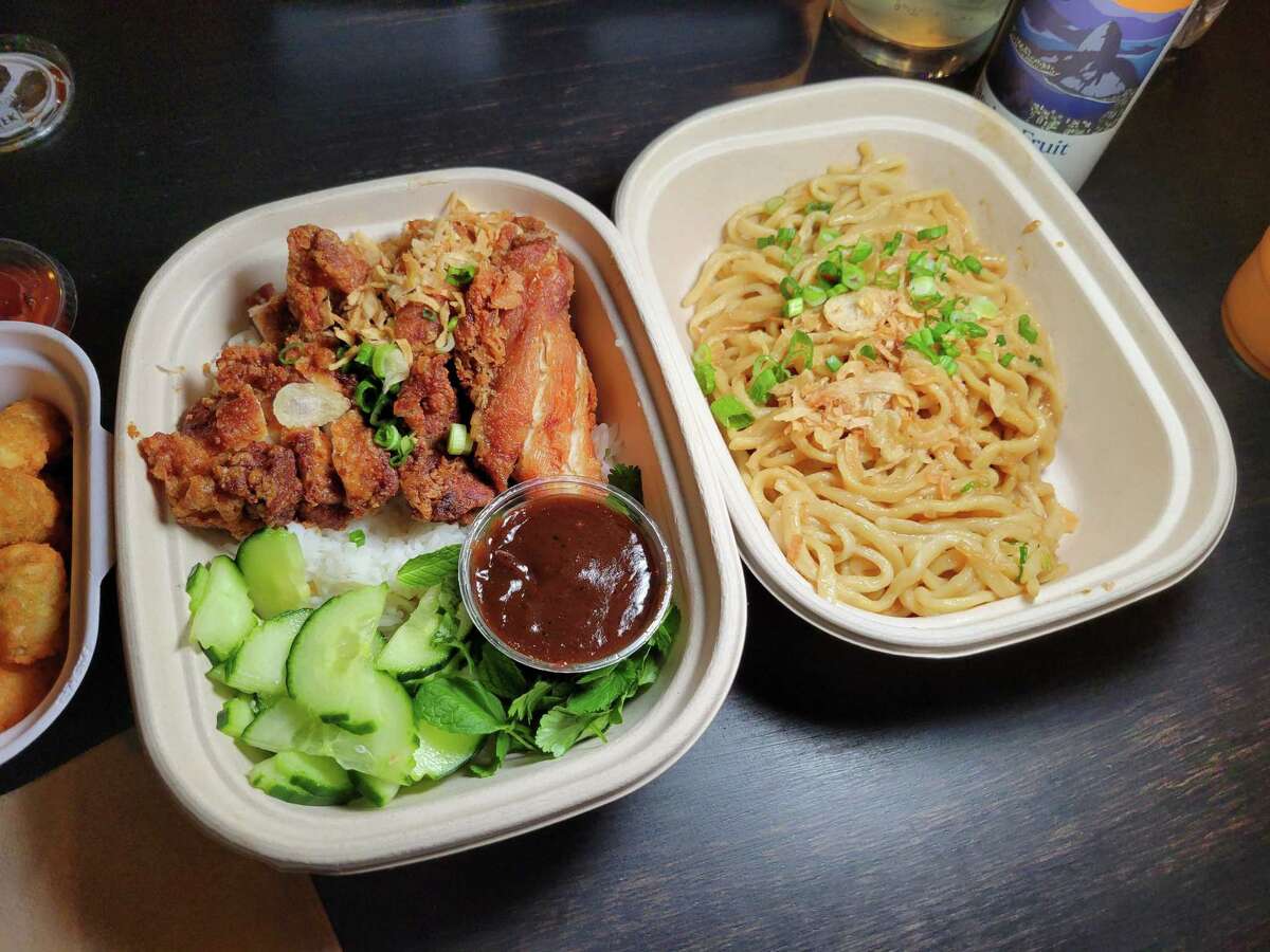 takeout boxes with garlic noodles