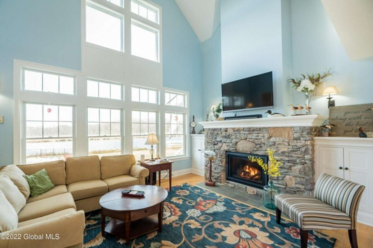 Can you guess the price of this custom, waterfront home in Saratoga?