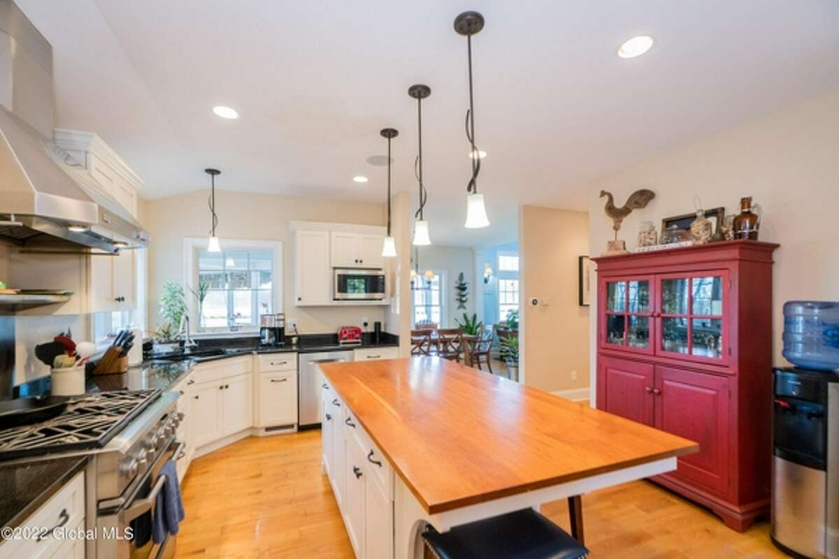 Can you guess the price of this custom, waterfront home in Saratoga?