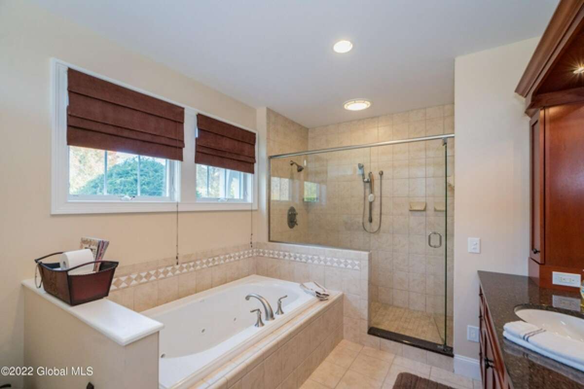 Can you guess the price of this custom, waterfront home in Saratoga?