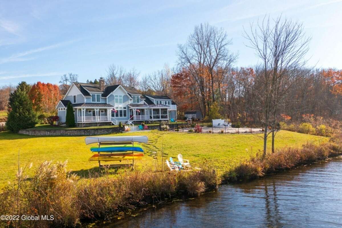 Can you guess the price of this custom, waterfront home in Saratoga?