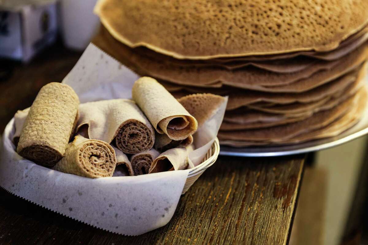 injera shown in rolls and stacks.