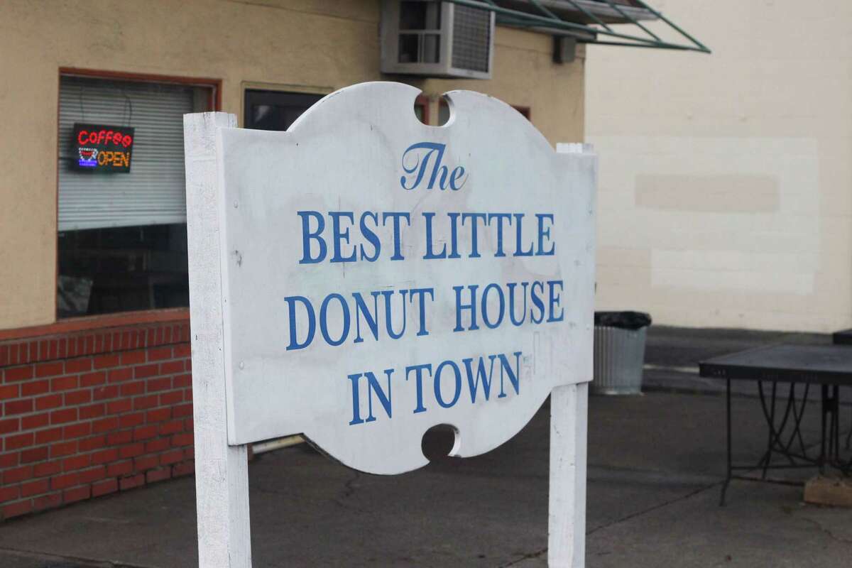 Sign that reads "Best Little Donut House in Town."