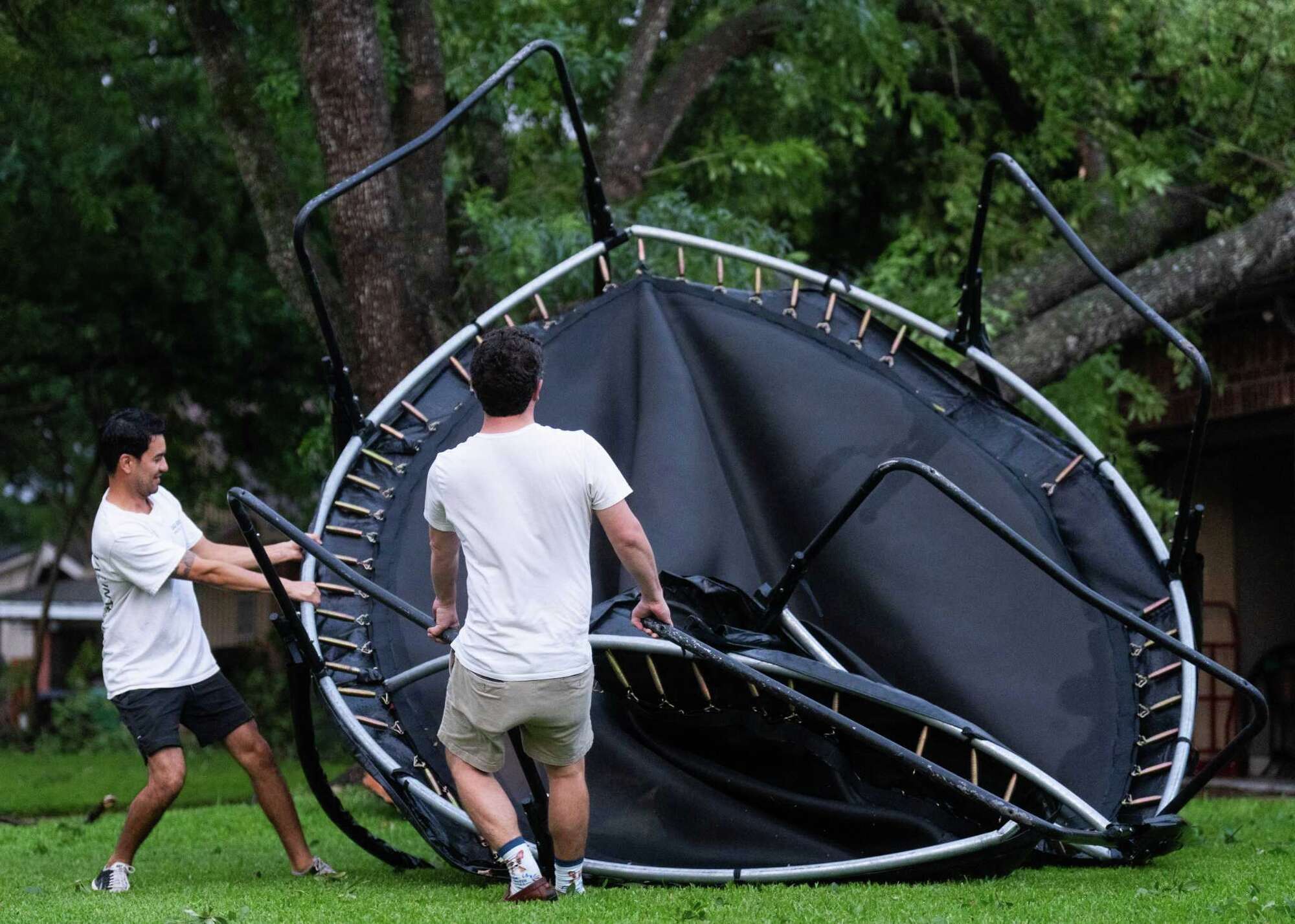 Photos: Houston storm with hurricane-like winds causes destruction