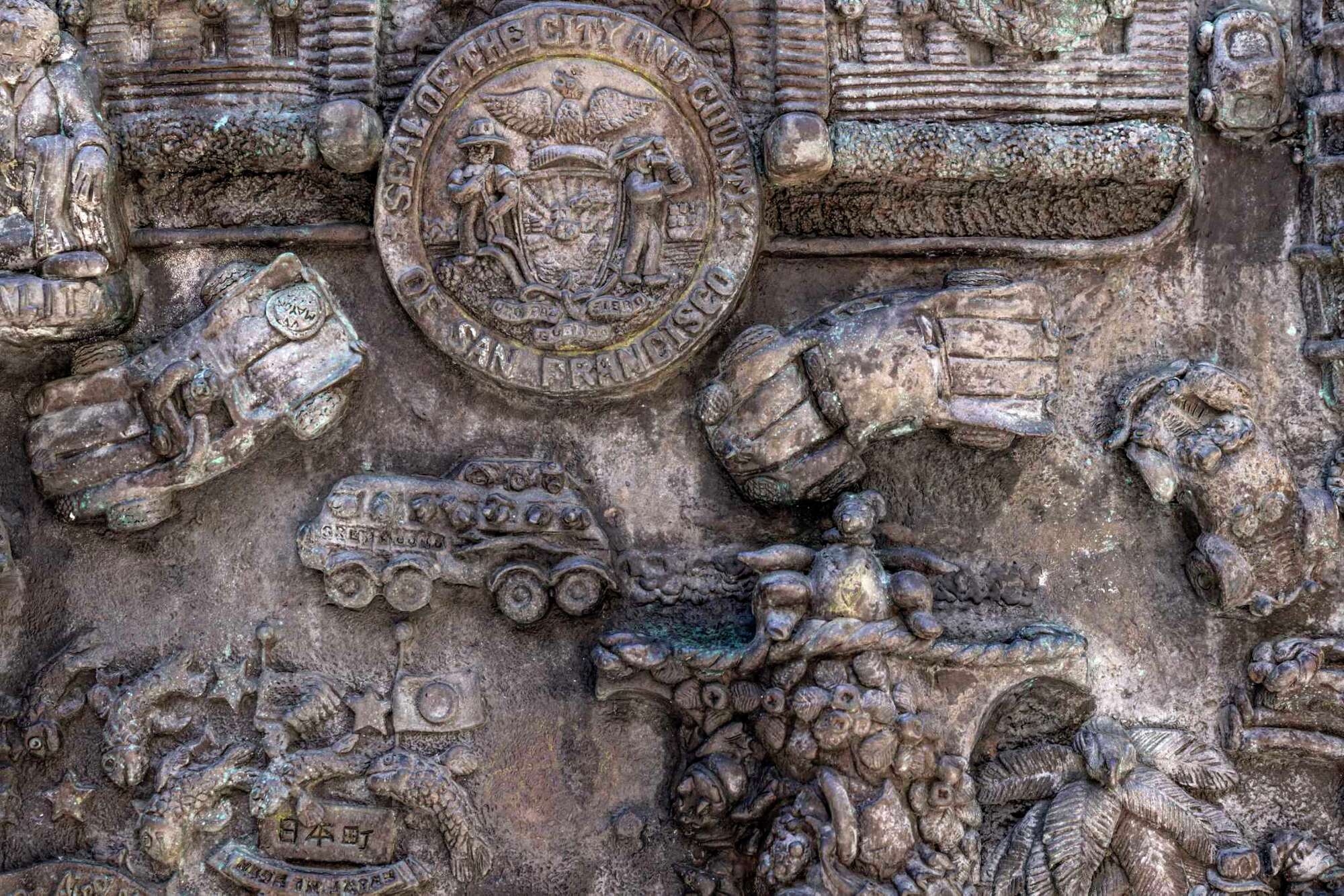 A detail photo of Ruth Asawa's "San Francisco Fountain" shows bending cars.