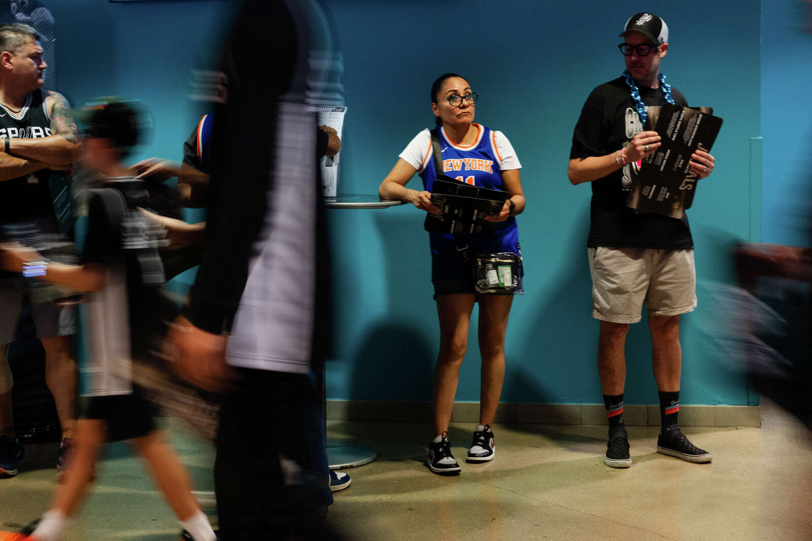 San Antonio Spurs and New York Knicks fans arrive at Frost Bank Center before Game 1 of the NBA Finals on June 3. (Sam Owens/San Antonio Express-News)