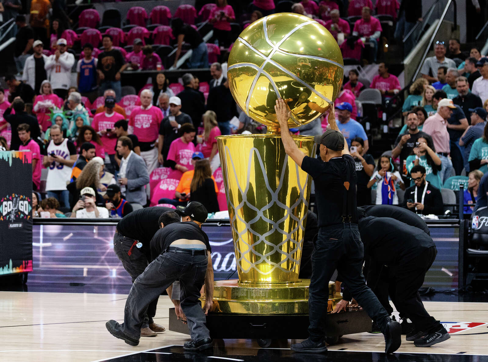 A giant championship trophy is wheeled onto the court before Game 1 of the NBA Finals. (Sam Owens/San Antonio Express-News)