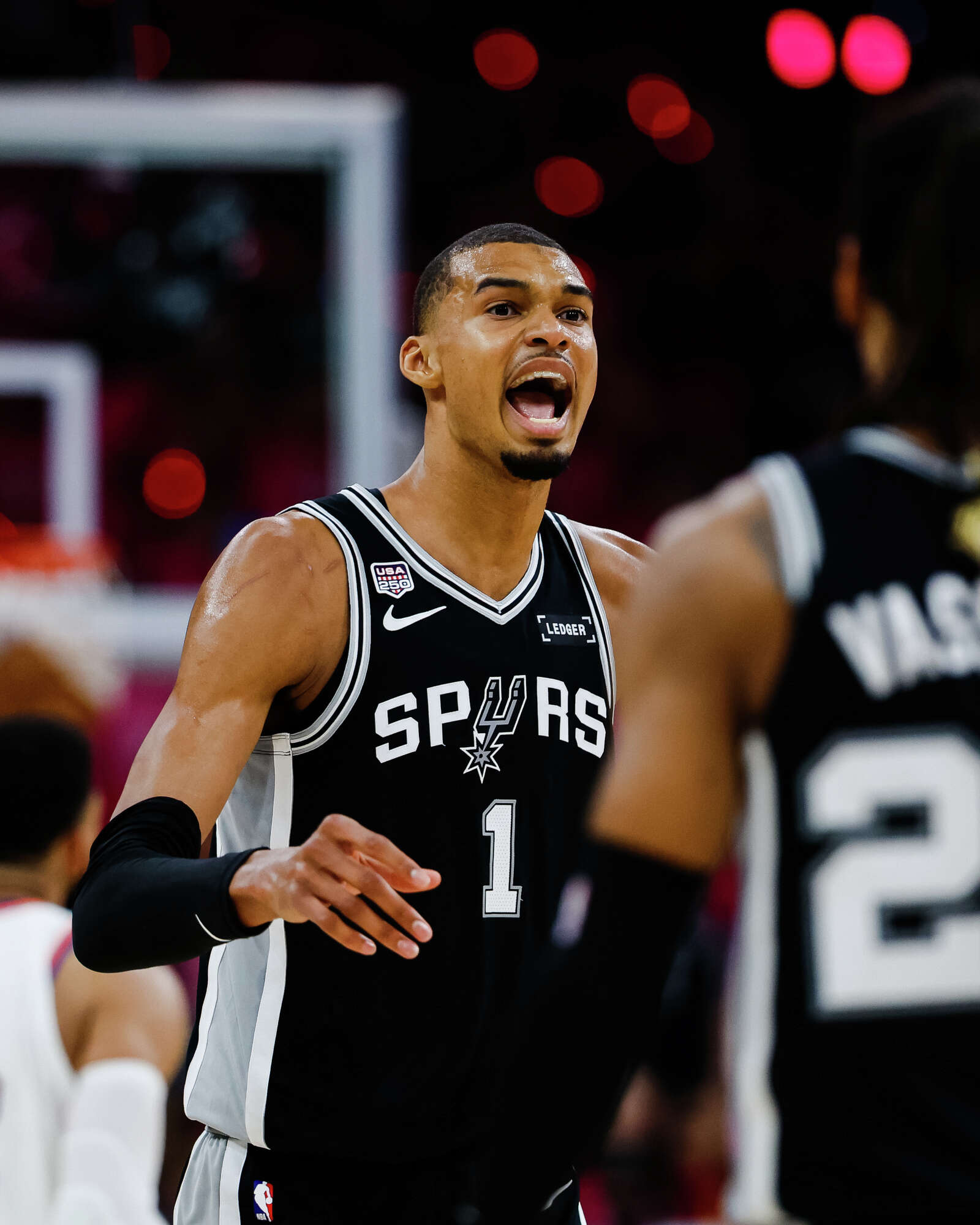 Spurs center Victor Wembanyama reacts to a play during Game 1 of the NBA Finals against the Knicks. (Sam Owens/San Antonio Express-News)