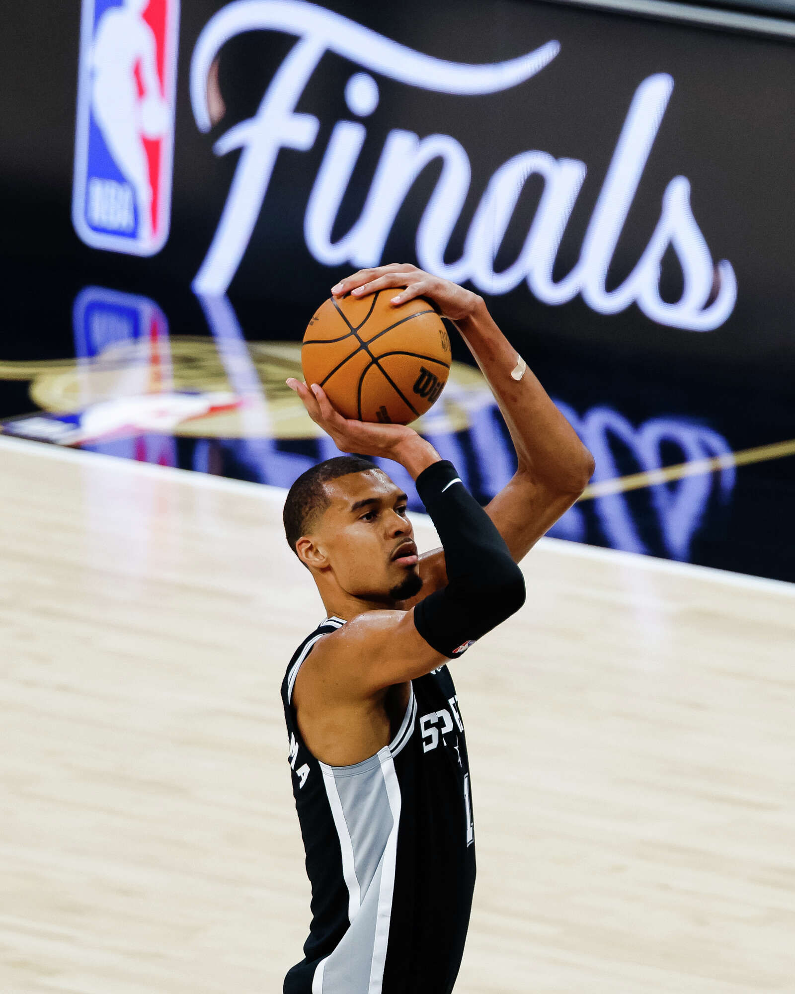 Spurs center Victor Wembanyama goes to shoot the ball during Game 1 of the NBA Finals against the New York Knicks. (Sam Owens/San Antonio Express-News)